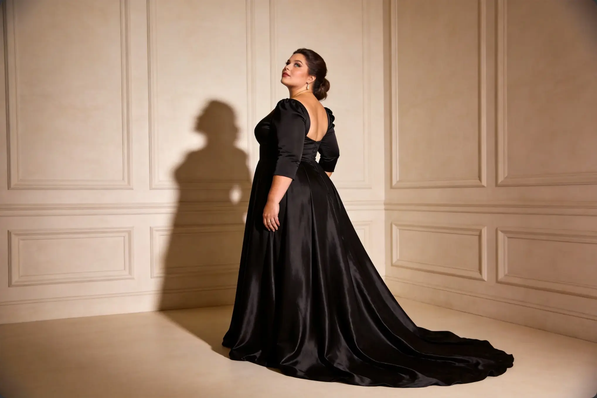 Plus size woman wearing an elegant formal evening dress for event styling reference
